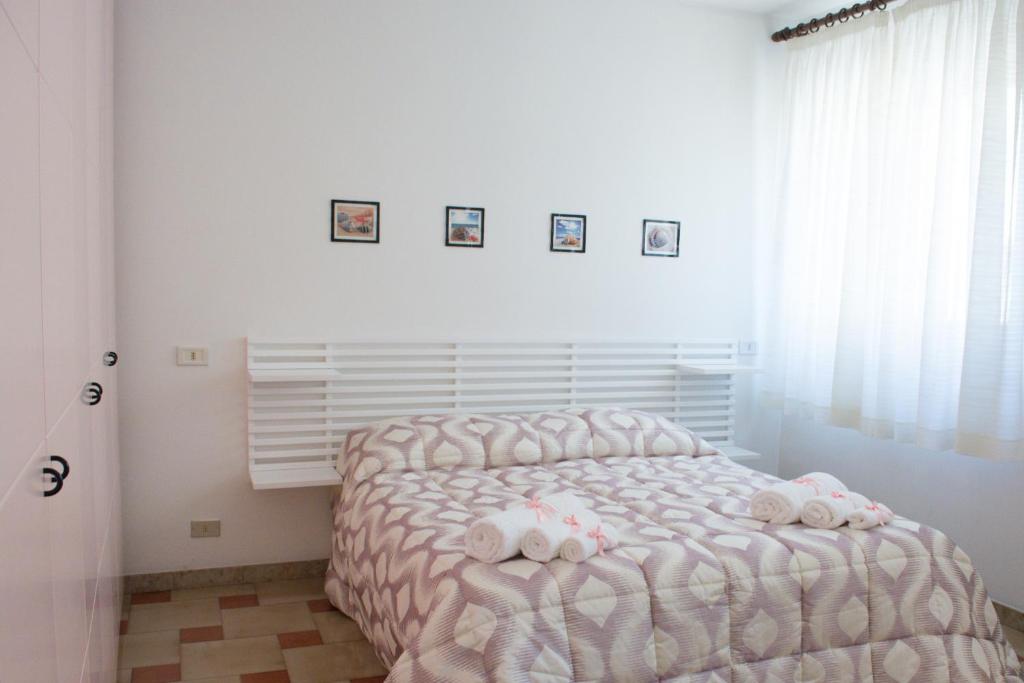 A bed or beds in a room at Agrigento CityCenter