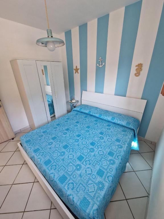 Postel nebo postele na pokoji v ubytování Casamarina Orchidea