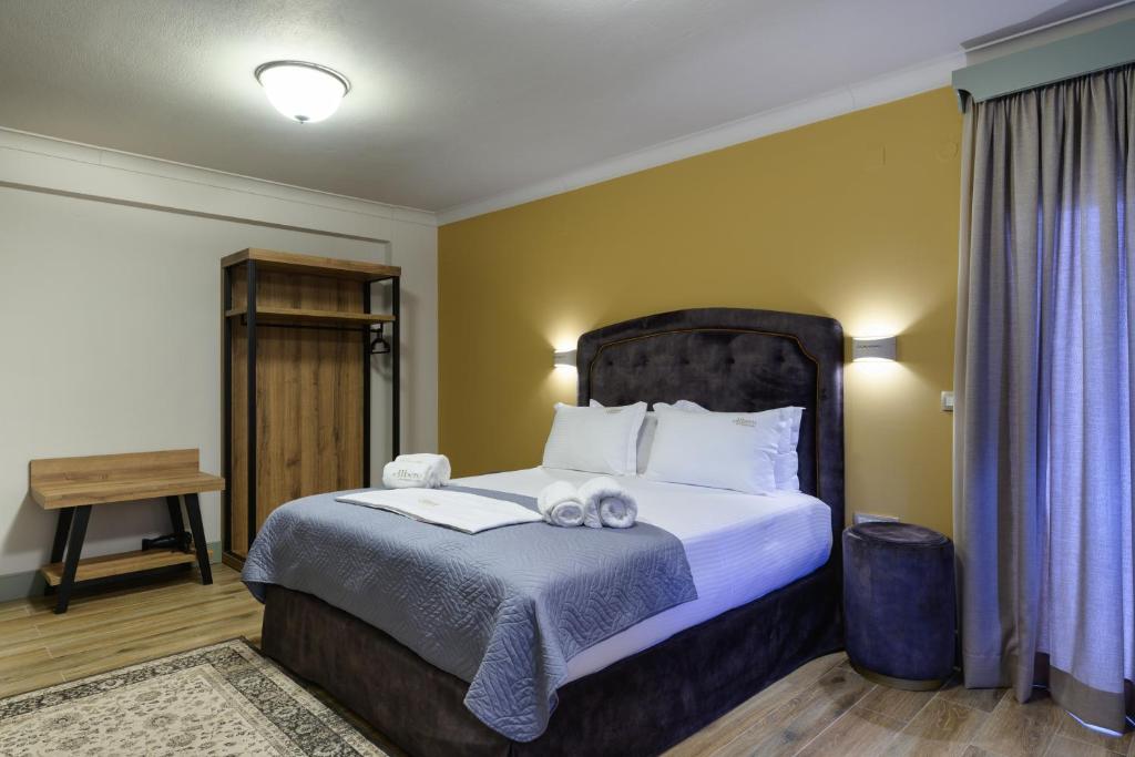 Postel nebo postele na pokoji v ubytování Álbero Hotel