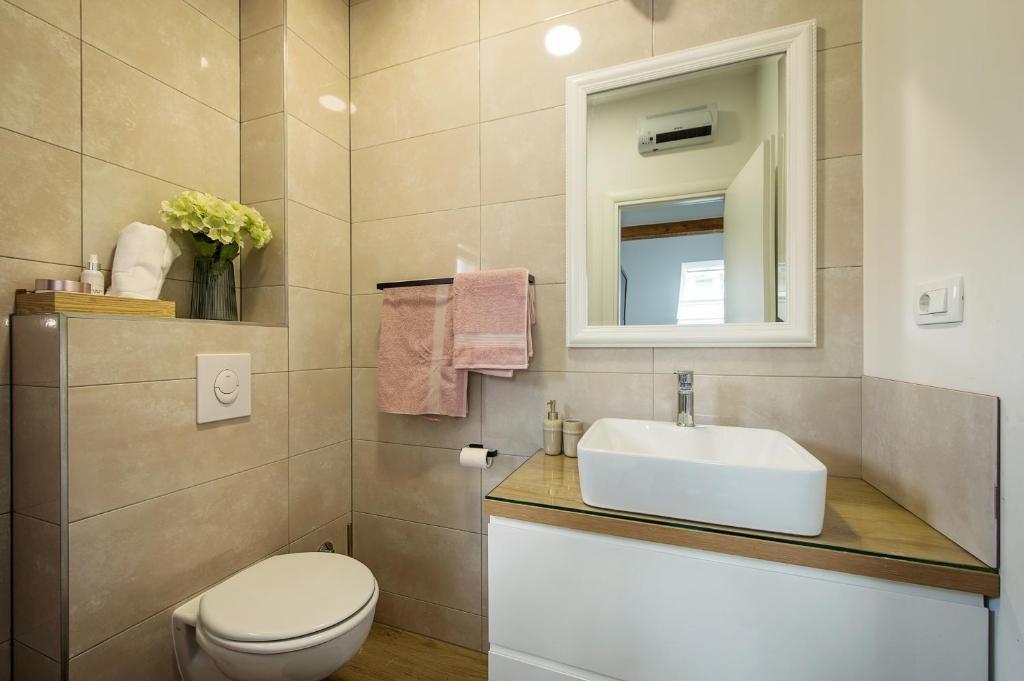 Koupelna v ubytování Apartman I & J