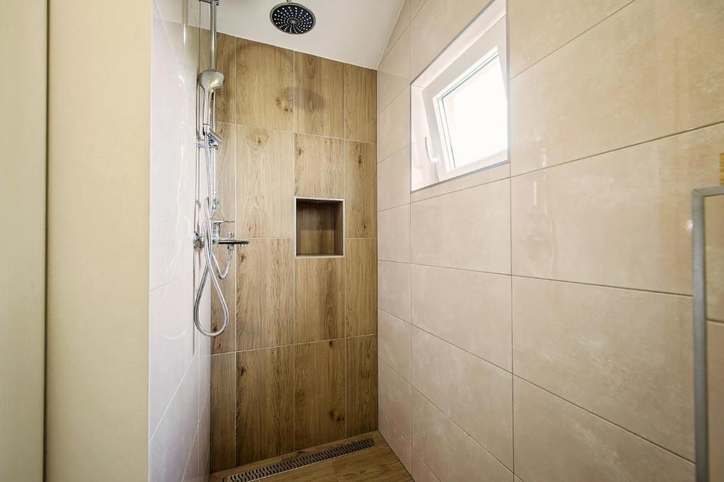 Koupelna v ubytování Apartman I & J