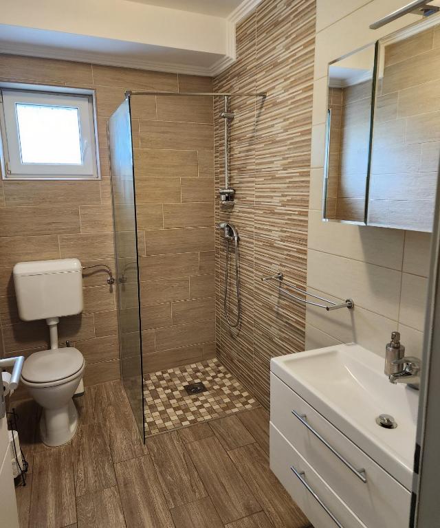 Koupelna v ubytování AlpenKlub Hotel