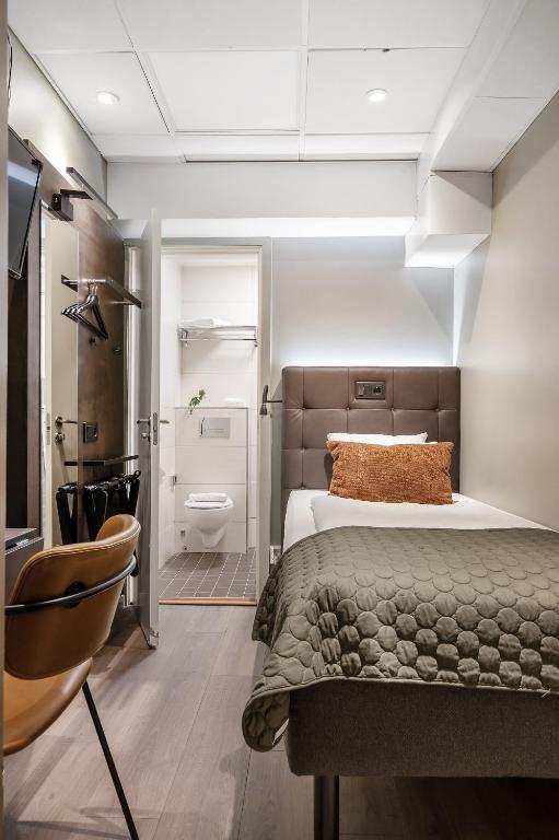 Postel nebo postele na pokoji v ubytování Hotel Point