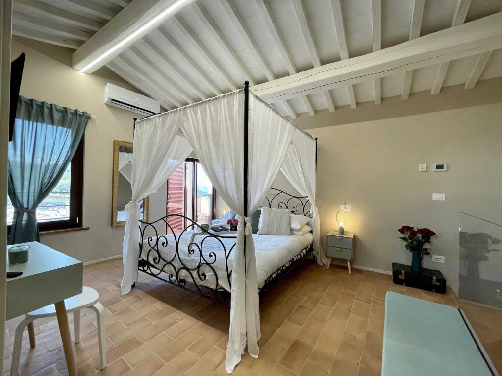 Postel nebo postele na pokoji v ubytování B&B La Fenice