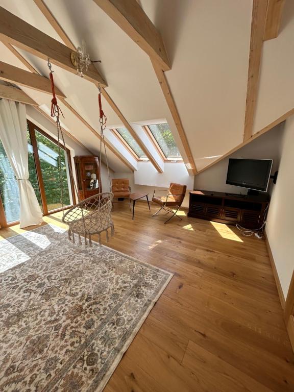 TV a/nebo společenská místnost v ubytování Leśna Residence & SPA