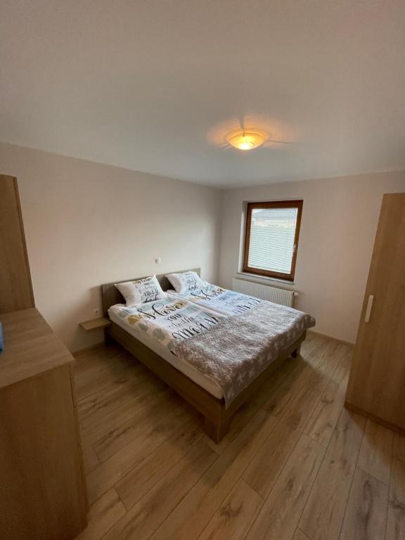 Postel nebo postele na pokoji v ubytování Apartma Ivana