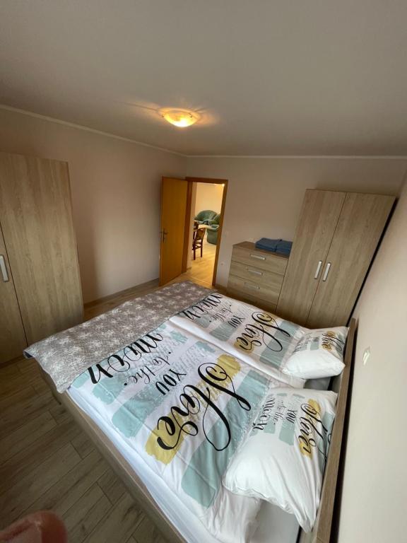 Postel nebo postele na pokoji v ubytování Apartma Ivana