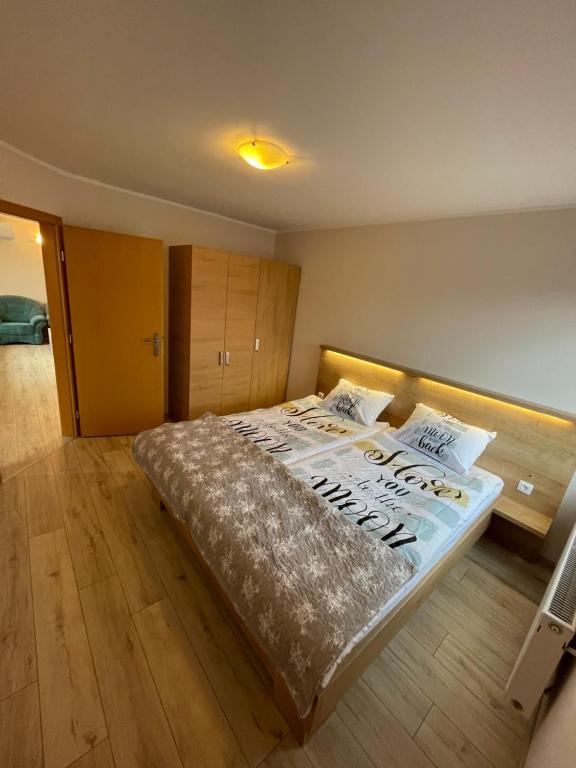 Postel nebo postele na pokoji v ubytování Apartma Ivana