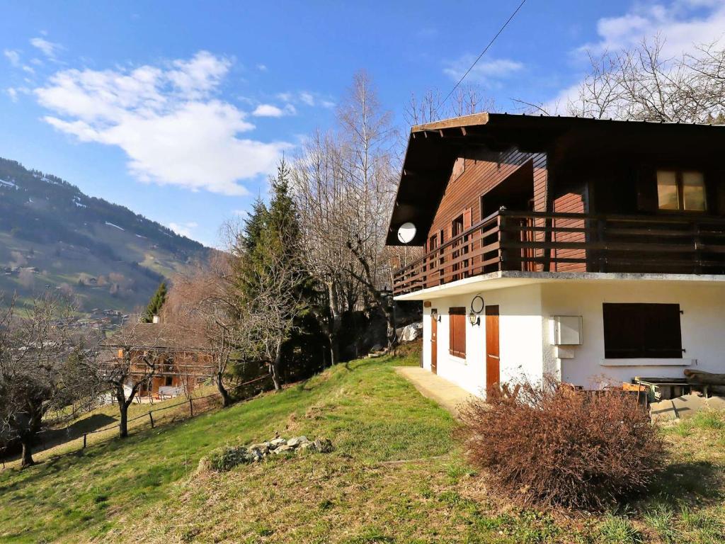 a house with a balcony on the side of it at Chalet Arêches-Beaufort, 4 pièces, 7 personnes - FR-1-342-234 in Beaufort
