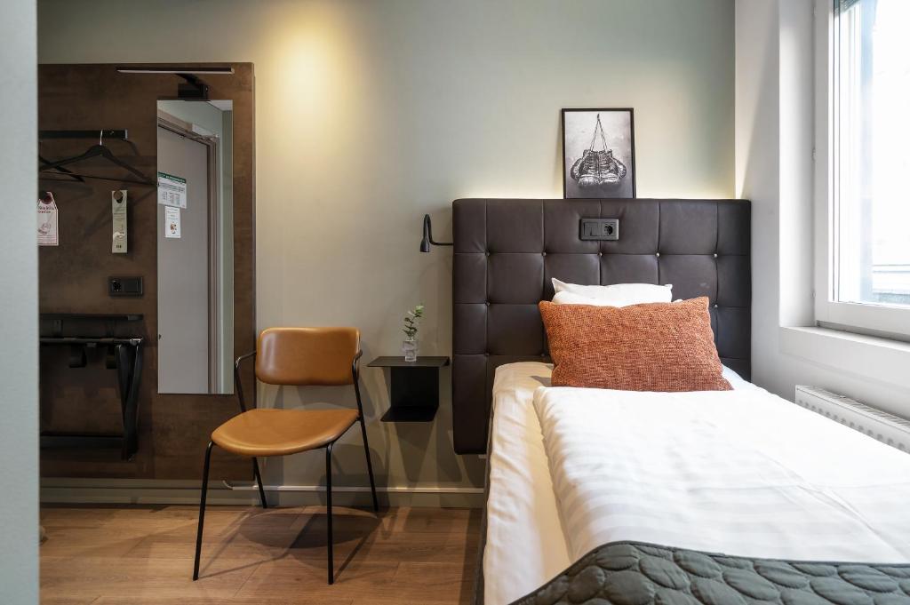 Postel nebo postele na pokoji v ubytování Hotel Point