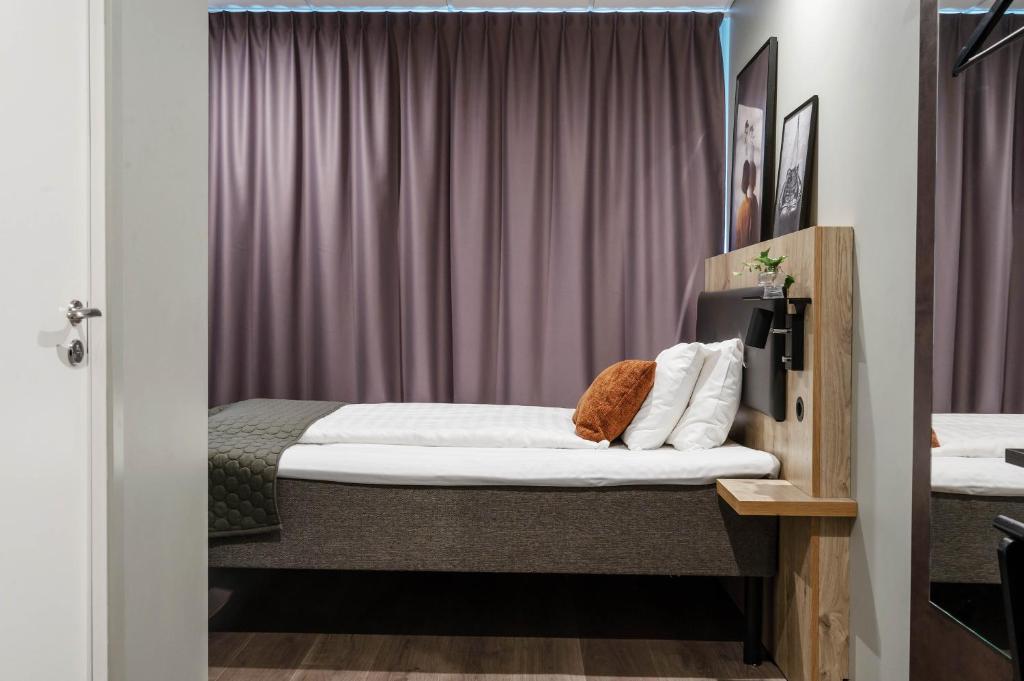 Postel nebo postele na pokoji v ubytování Hotel Point