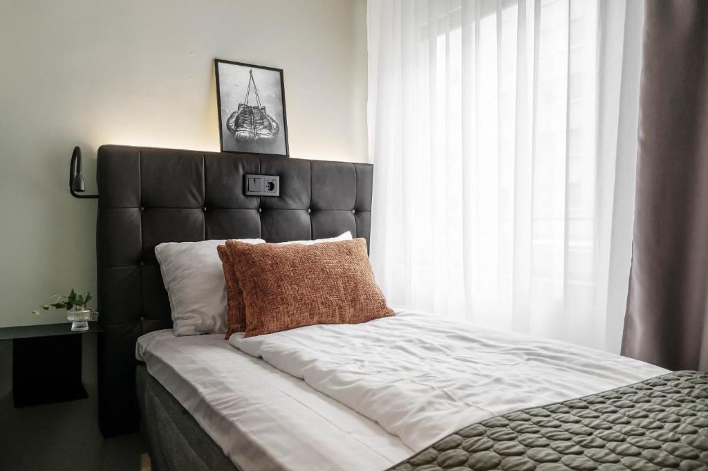 Postel nebo postele na pokoji v ubytování Hotel Point
