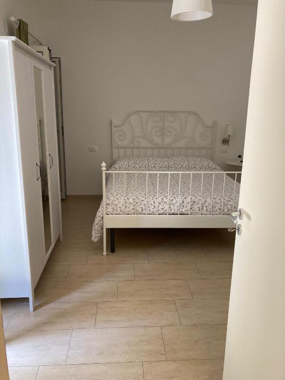 Postel nebo postele na pokoji v ubytování A Suata