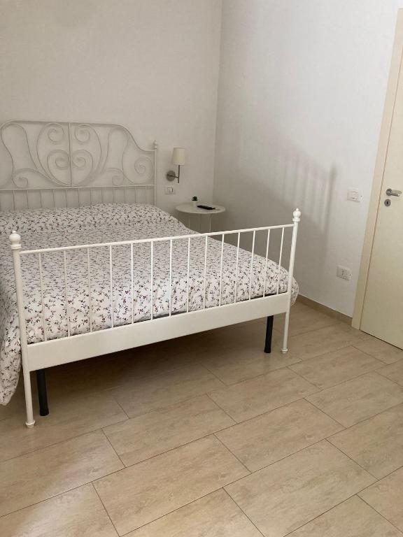 Postel nebo postele na pokoji v ubytování A Suata
