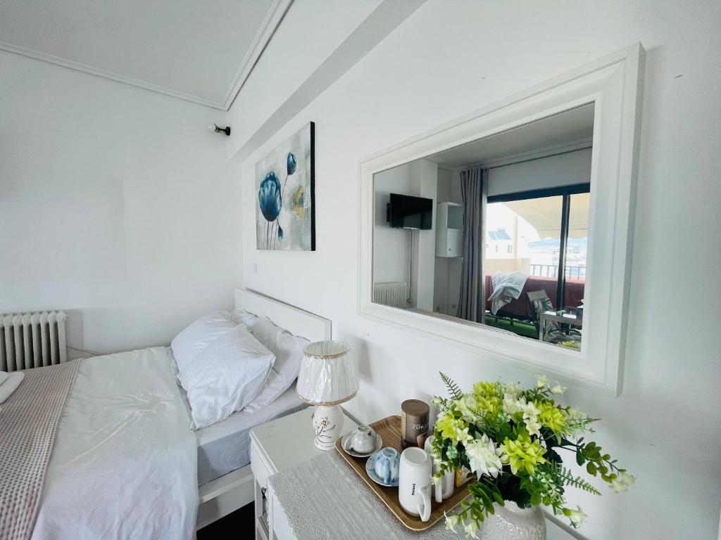 Ένα ή περισσότερα κρεβάτια σε δωμάτιο στο Top floor apartment
