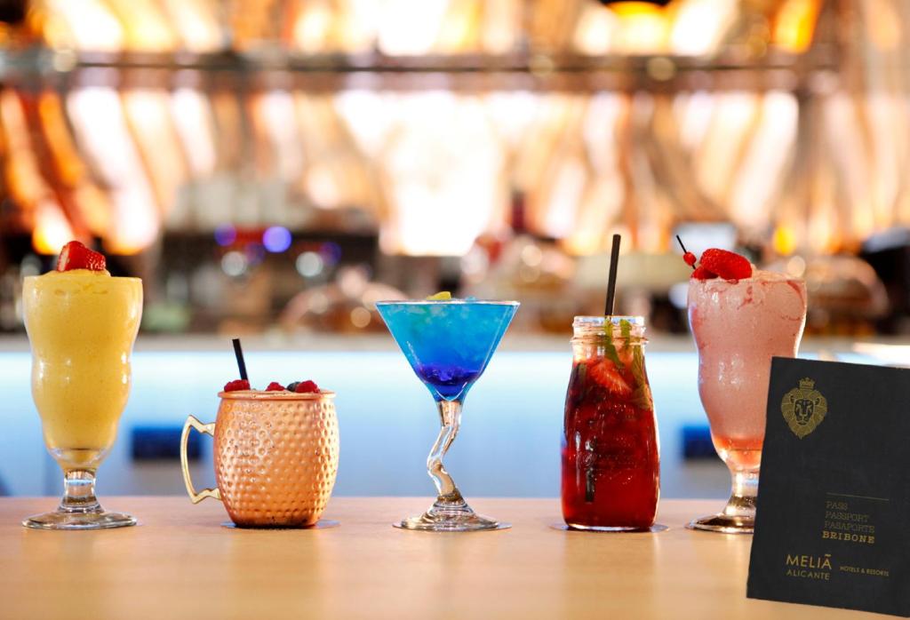 a group of four drinks sitting on a table at Melia Alicante in Alicante