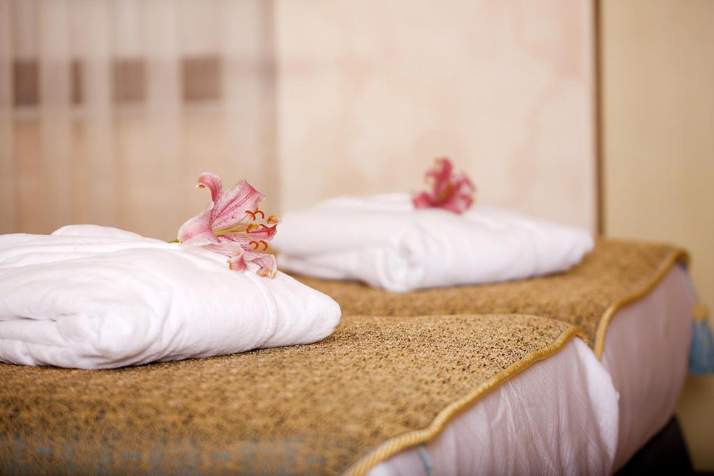 Postel nebo postele na pokoji v ubytování Edibe Sultan Hotel