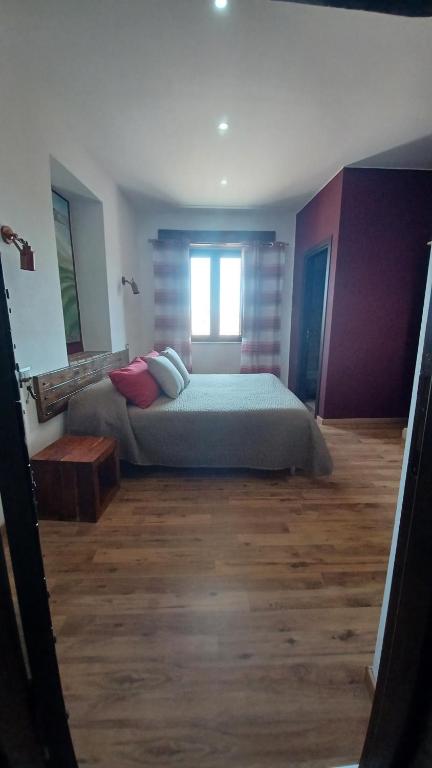 Posteľ alebo postele v izbe v ubytovaní B&B Le Vie del Borgo