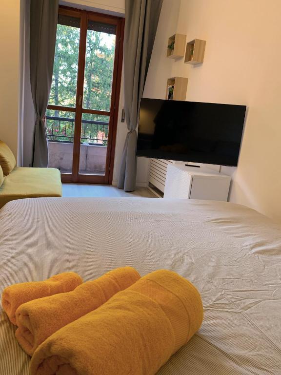 Postel nebo postele na pokoji v ubytování Casa di Arianna in centro storico a Vimercate