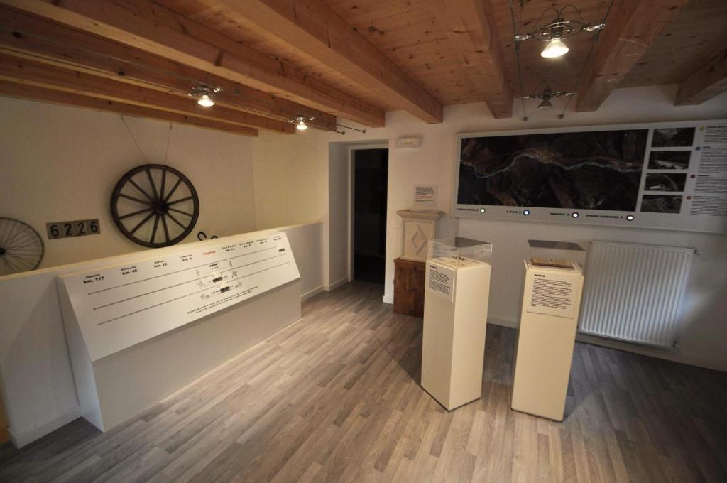 TV a/nebo společenská místnost v ubytování Museo Ostello