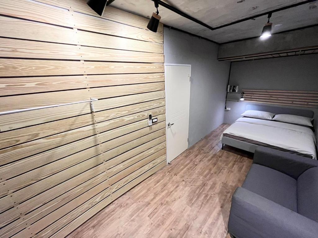 Postel nebo postele na pokoji v ubytování Ruifang Yi Hostel