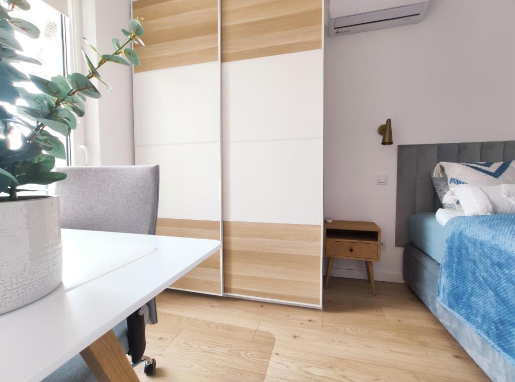 Posteľ alebo postele v izbe v ubytovaní Mogilska 120D by Homeprime