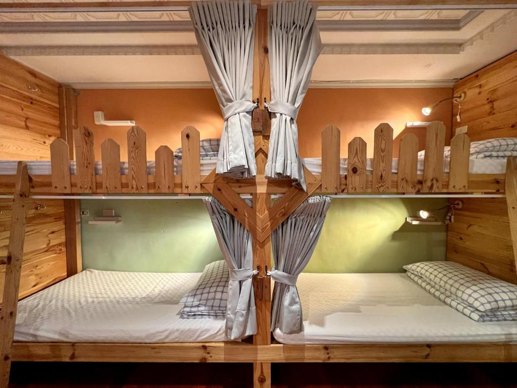 Postel nebo postele na pokoji v ubytování Gift Box Hostel