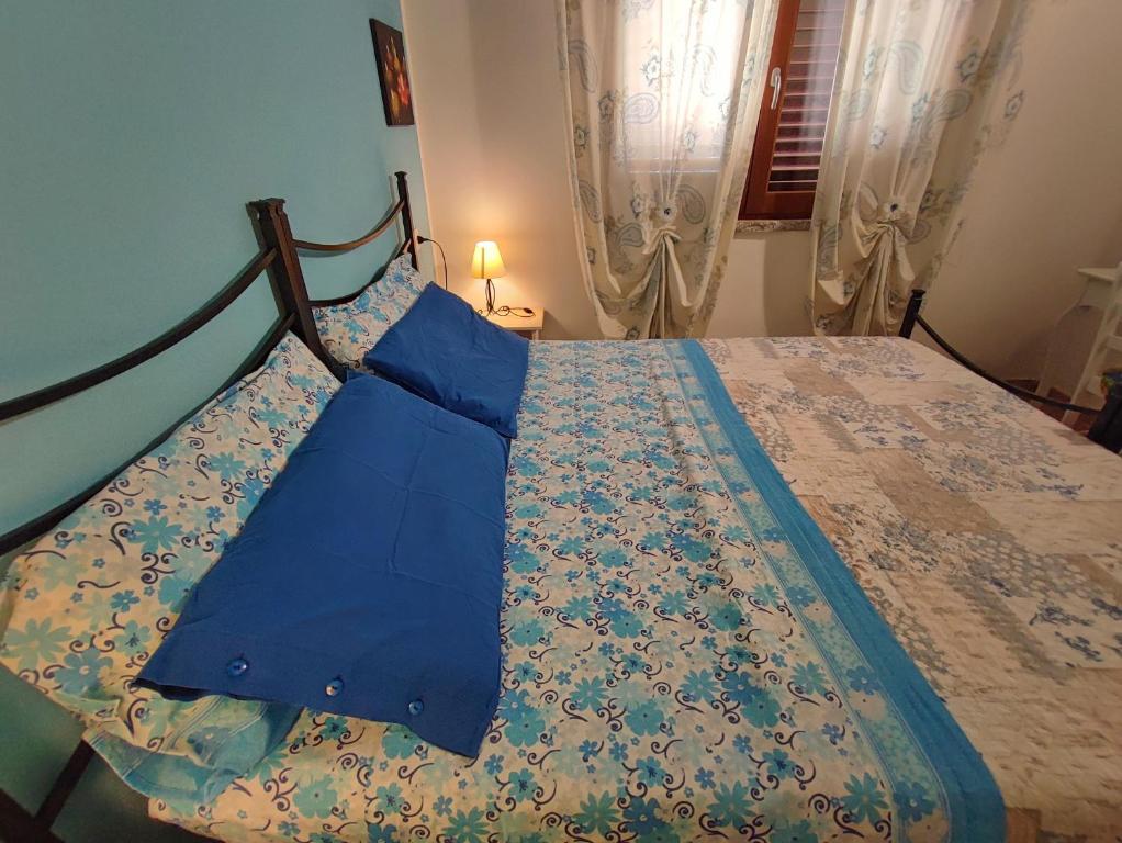 Postel nebo postele na pokoji v ubytování Il Fenicottero 2
