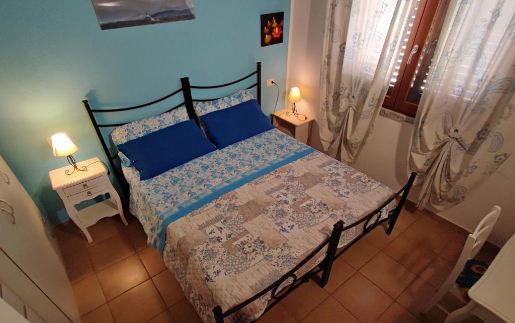 Postel nebo postele na pokoji v ubytování Il Fenicottero 2