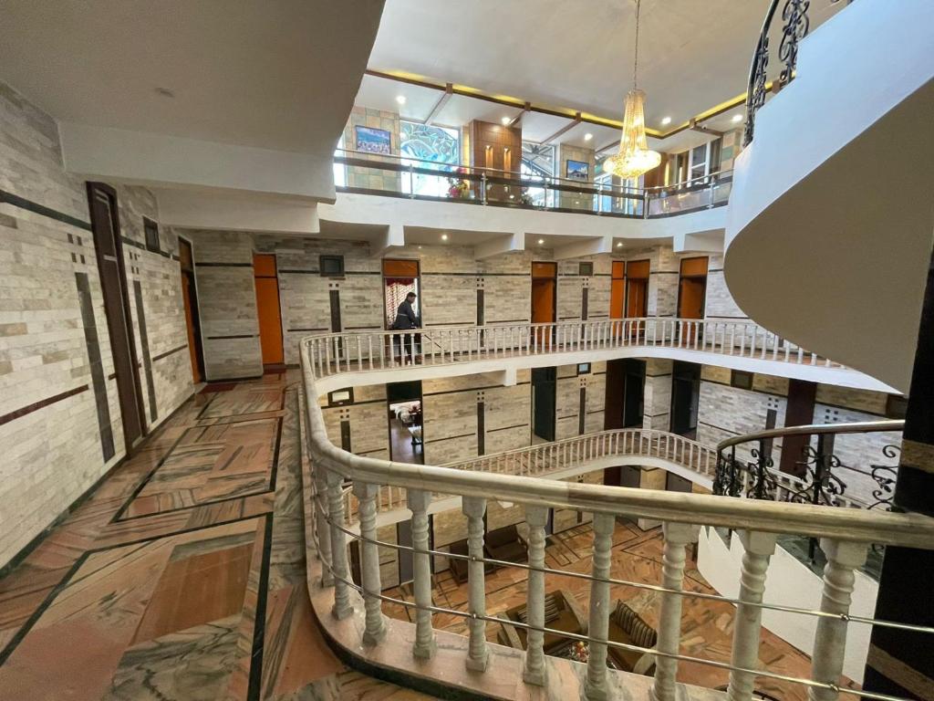 a view of a building with a spiral staircase at Exquisite Luxurious Presidential Stay- Pure Veg in Dalhousie