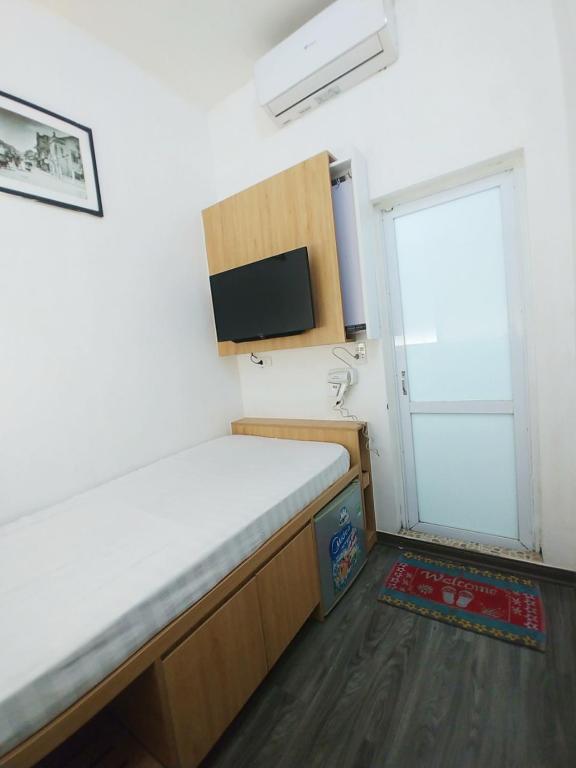 TV a/nebo společenská místnost v ubytování Hanoi Discovery Hotel
