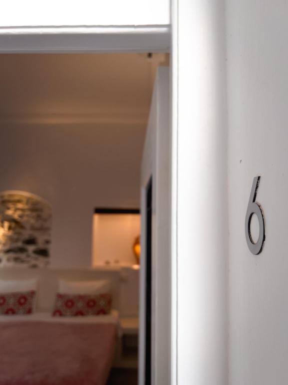 Voodi või voodid majutusasutuse Aggelikoula Rooms toas