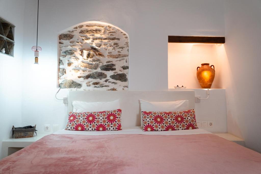 Voodi või voodid majutusasutuse Aggelikoula Rooms toas