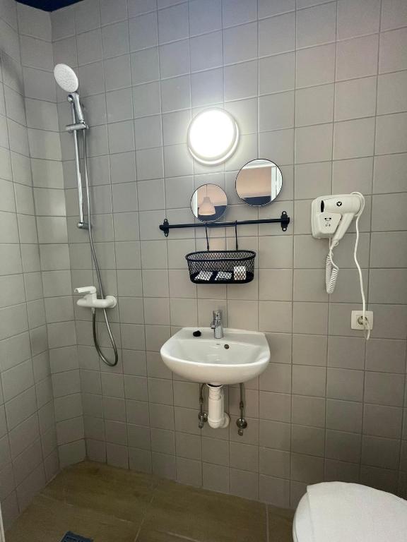 Koupelna v ubytování Hotel HEB
