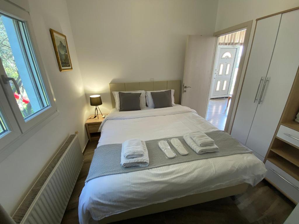 Łóżko lub łóżka w pokoju w obiekcie Villa Blue Apartments