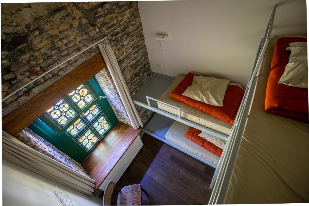 Postel nebo postele na pokoji v ubytování Hostel Uppelink