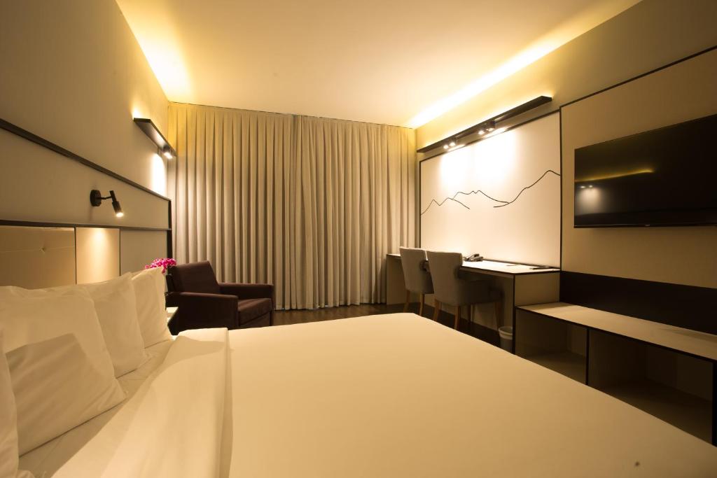 Cama ou camas em um quarto em Transamerica Lagoa dos Ingleses