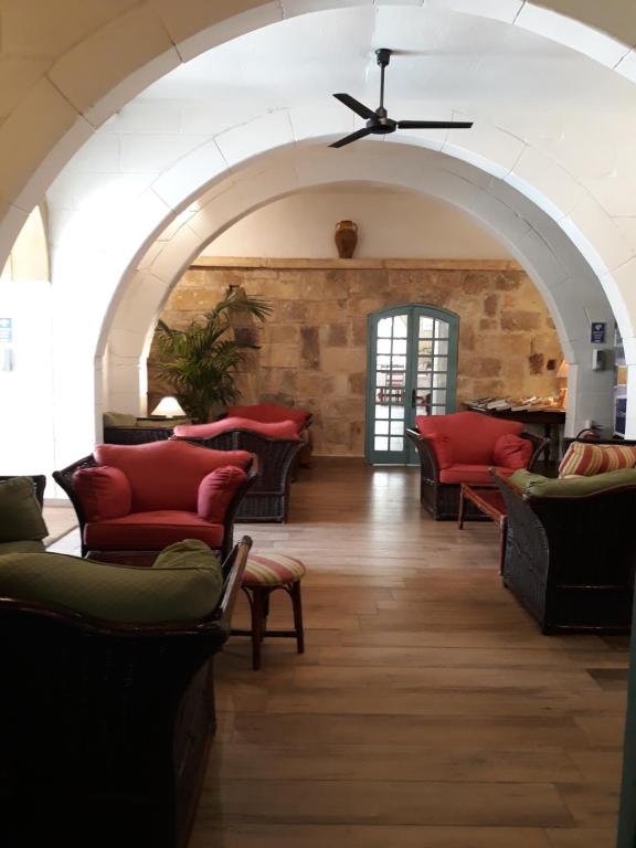 Posezení v ubytování Cornucopia Hotel
