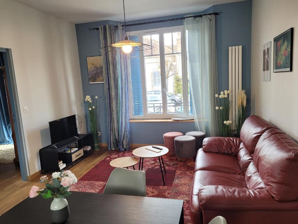 Posezení v ubytování Appartements CDG JOIGNY