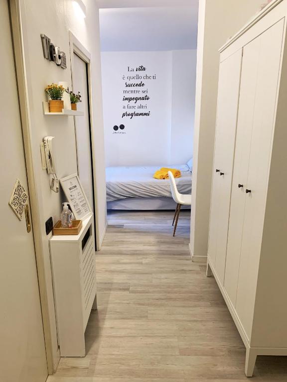 Postel nebo postele na pokoji v ubytování Casa di Arianna in centro storico a Vimercate