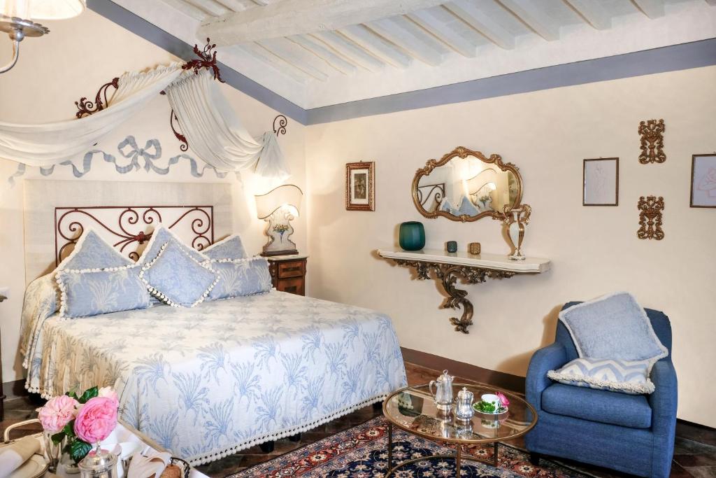 Łóżko lub łóżka w pokoju w obiekcie Il Falconiere Relais & Spa