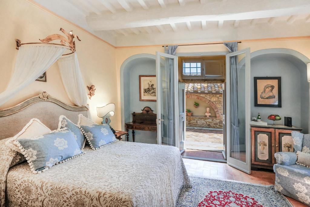 Łóżko lub łóżka w pokoju w obiekcie Il Falconiere Relais & Spa