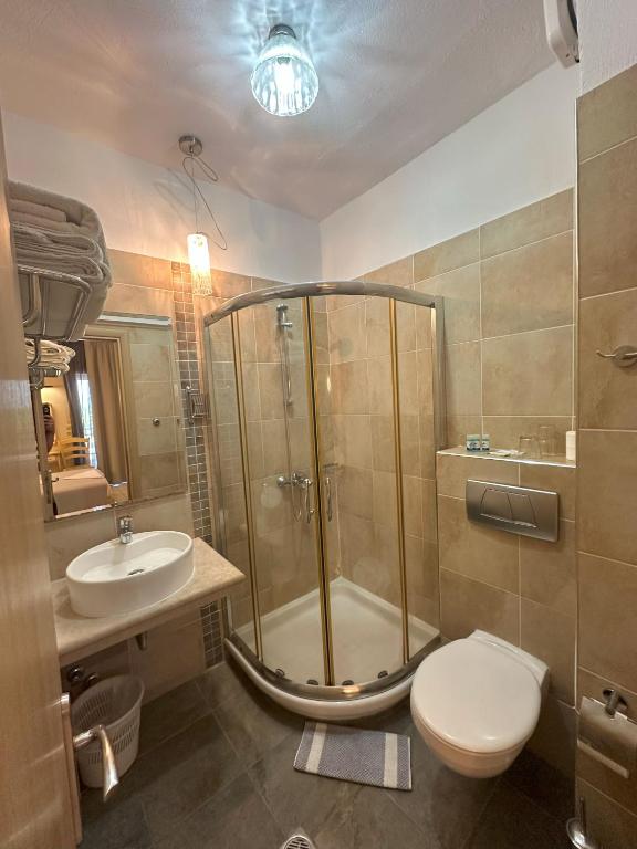 Koupelna v ubytování Hotel Afrodite