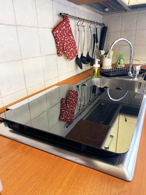 Kuchyň nebo kuchyňský kout v ubytování Casa di Arianna in centro storico a Vimercate