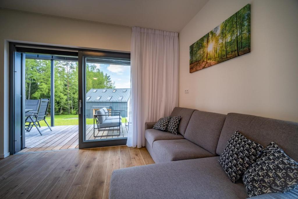 Posezení v ubytování Holiday House U Hájenky 11P Lipno Home
