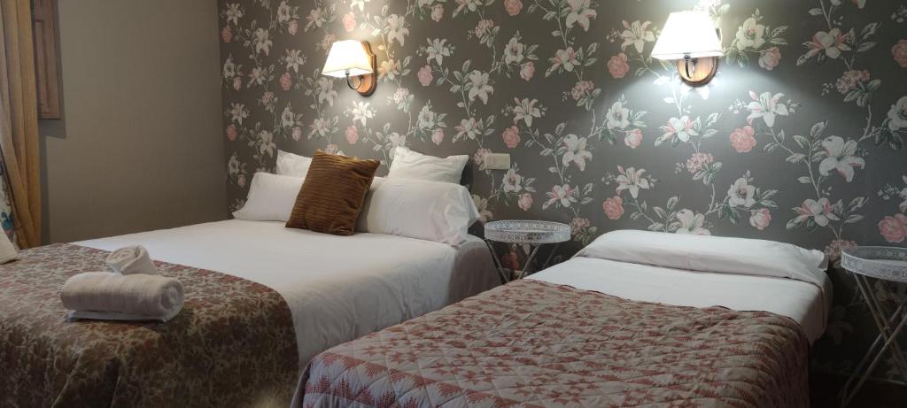 Postel nebo postele na pokoji v ubytování Hotel Río Escabas, Serranía de Cuenca