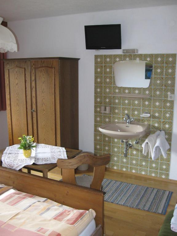 Postel nebo postele na pokoji v ubytování Haus Steinlechner