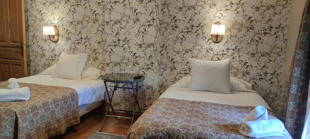 Postel nebo postele na pokoji v ubytování Hotel Río Escabas, Serranía de Cuenca