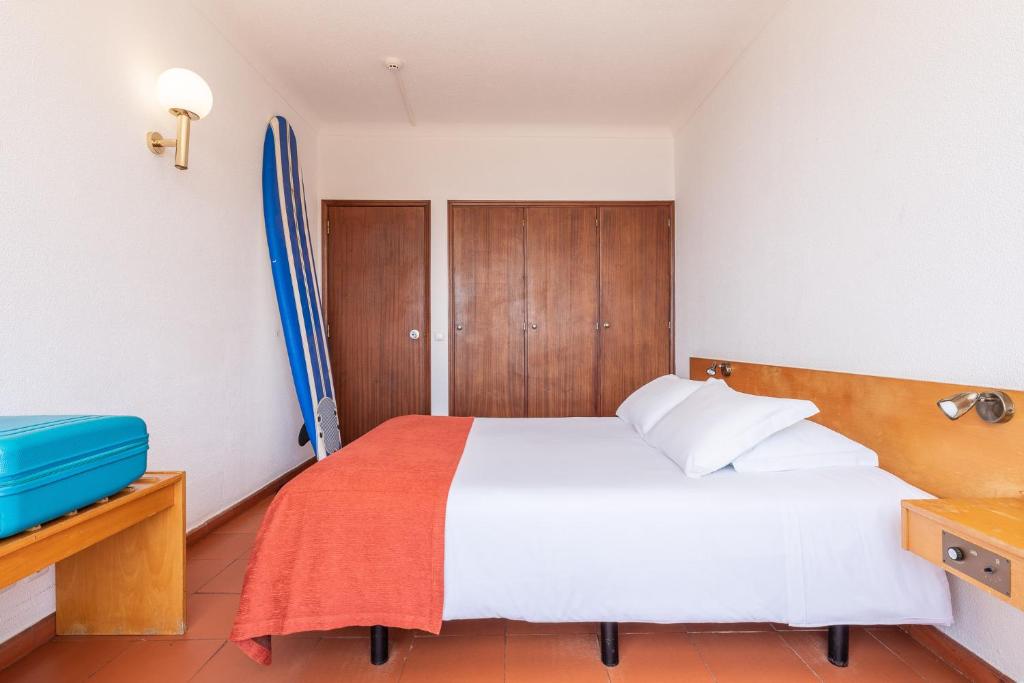 Postel nebo postele na pokoji v ubytování Aparthotel Navigator