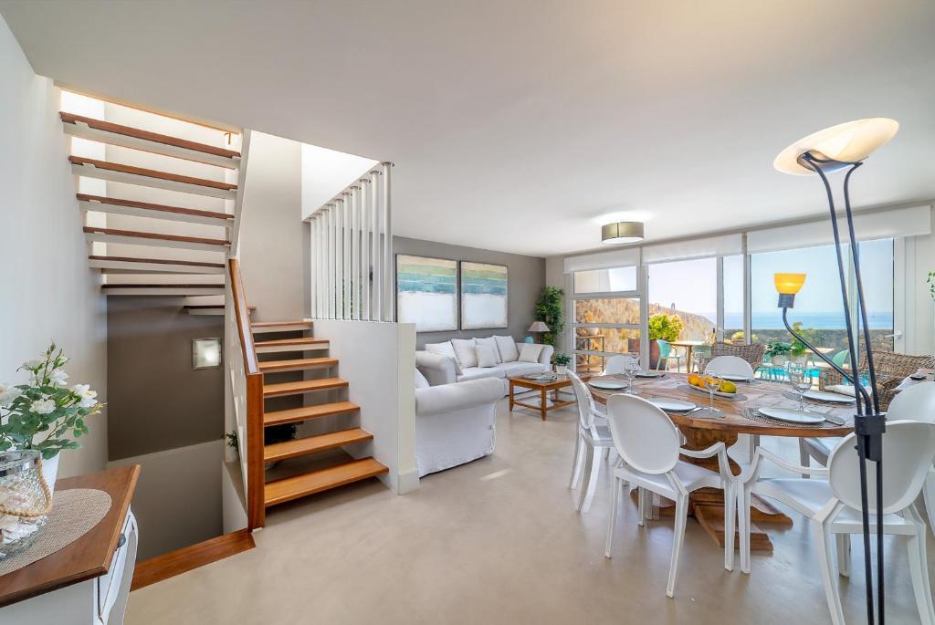 A seating area at VV Vista Oceano by HH - Ocean view with private pool